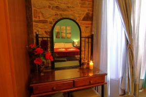 A bed or beds in a room at Ionia rooms