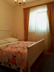 Postel nebo postele na pokoji v ubytování Apartments Vrisak