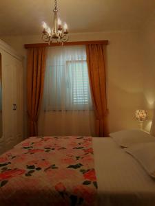 Postel nebo postele na pokoji v ubytování Apartments Vrisak