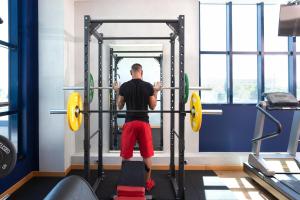 Fitness centrum a/nebo fitness zařízení v ubytování Garda Hotel