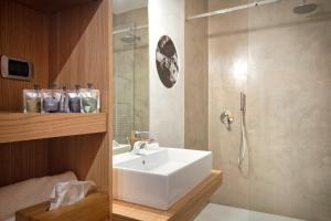 Koupelna v ubytování Garda Hotel