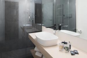 Koupelna v ubytování Garda Hotel
