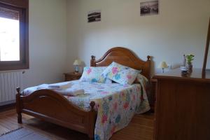 A bed or beds in a room at A Veiga Grande