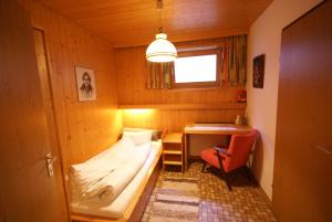 Postel nebo postele na pokoji v ubytování Haus Oblasser
