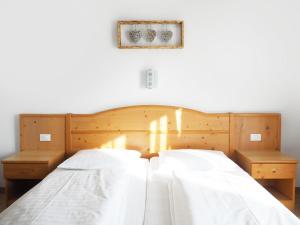 Postel nebo postele na pokoji v ubytování Guesthouse Rungg