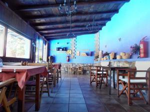 A restaurant or other place to eat at Ilios Studios