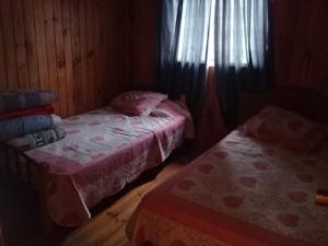Postel nebo postele na pokoji v ubytování Casa Canelo