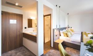 Bel Residence客房内的一张或多张床位