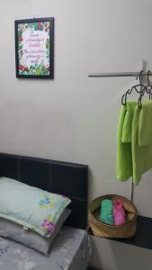 Postel nebo postele na pokoji v ubytování D'Hartamas Guesthouse
