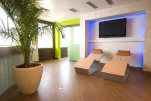 TV a/nebo společenská místnost v ubytování Garni Hotel Aleksandar