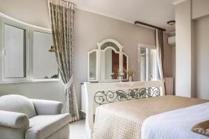 A bed or beds in a room at Hidden Gem Estate - Superior luxury villa large private pool stunning sea & mountain views 5 acres of lush gardens World class accommodation