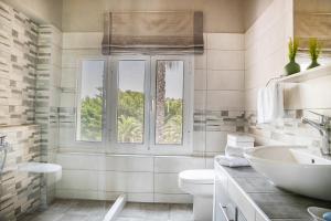 A bathroom at Hidden Gem Estate - Superior luxury villa large private pool stunning sea & mountain views 5 acres of lush gardens World class accommodation