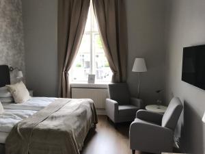 Postel nebo postele na pokoji v ubytování Hotell Humbla