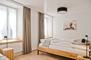 Voodi või voodid majutusasutuse Hotel Bären Guttannen toas