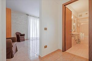 Koupelna v ubytování Albergo Rondò + 37 fotografií