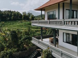 Balkón nebo terasa v ubytování Candra Cottage