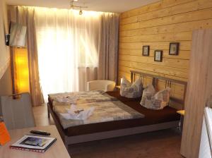 
Ein Bett oder Betten in einem Zimmer der Unterkunft Haus Oberkassel
