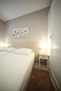 Posteľ alebo postele v izbe v ubytovaní Teatro Verdi Accommodation