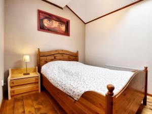 Postel nebo postele na pokoji v ubytování Rustic Farm Stay in Rogery