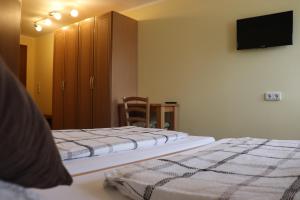 Postel nebo postele na pokoji v ubytování Hotel Zum Waldstein