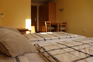 Postel nebo postele na pokoji v ubytování Hotel Zum Waldstein