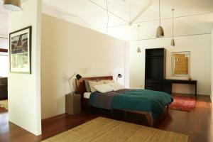 Ένα ή περισσότερα κρεβάτια σε δωμάτιο στο Anagama House & Studio