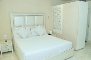 Cama o camas de una habitación en Nagpal Regency