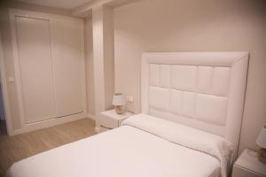 Postel nebo postele na pokoji v ubytování Apartamento BellaVista