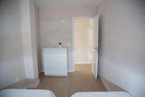 Posteľ alebo postele v izbe v ubytovaní Apartamento BellaVista