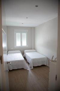 Posteľ alebo postele v izbe v ubytovaní Apartamento BellaVista