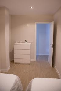 Posteľ alebo postele v izbe v ubytovaní Apartamento BellaVista