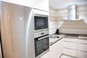 Kuchyňa alebo kuchynka v ubytovaní Apartamento BellaVista