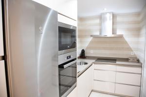 Kuchyňa alebo kuchynka v ubytovaní Apartamento BellaVista