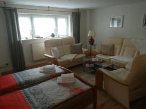 Ein Sitzbereich in der Unterkunft FerienWohnung Gebhardt