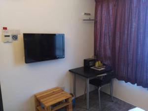 TV a/nebo společenská místnost v ubytování The Verve Hotel PJ Damansara