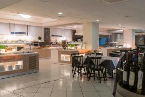 
A restaurant or other place to eat at Elea Beach Hotel
