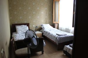 Postel nebo postele na pokoji v ubytování Nunua's Bed and Breakfast