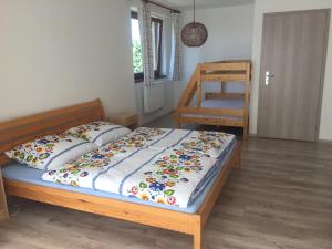 Ένα ή περισσότερα κρεβάτια σε δωμάτιο στο U Pepíka