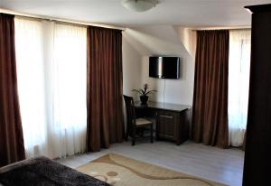 TV a/nebo společenská místnost v ubytování Silva House