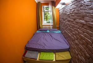 Postel nebo postele na pokoji v ubytování Hostel Loco