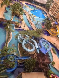 Бассейн в Bestari Homestay @ Gold Coast Morib или поблизости