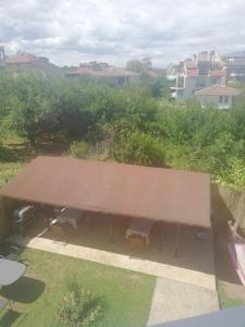 an overhead view of a building with a brown roof at Къща Мариела in Sinemorets