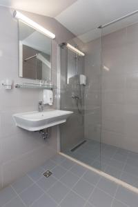 Koupelna v ubytování Hotel Vimbula - Komolac