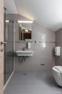 Koupelna v ubytování Hotel Vimbula - Komolac
