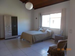 Katil atau katil-katil dalam bilik di Cote Dazur Residence Imbassai +55 gambar
