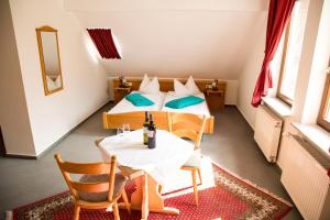 Postel nebo postele na pokoji v ubytování Hotel Janssen