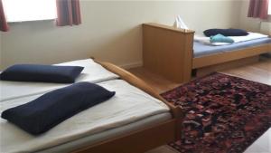Postel nebo postele na pokoji v ubytování Hotel Janssen