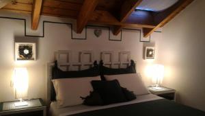 A bed or beds in a room at B&B LE MAGNOLIE