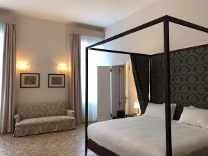 Posteľ alebo postele v izbe v ubytovaní Suites alla Maddalena
