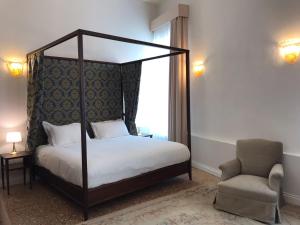 Posteľ alebo postele v izbe v ubytovaní Suites alla Maddalena